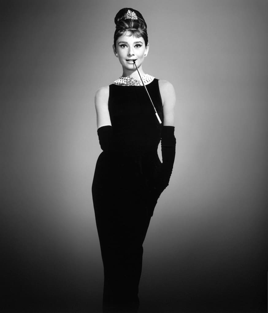 Audrey in "the original little black dress" designed by Givenchy for Breakfast at Tiffany's (1961)