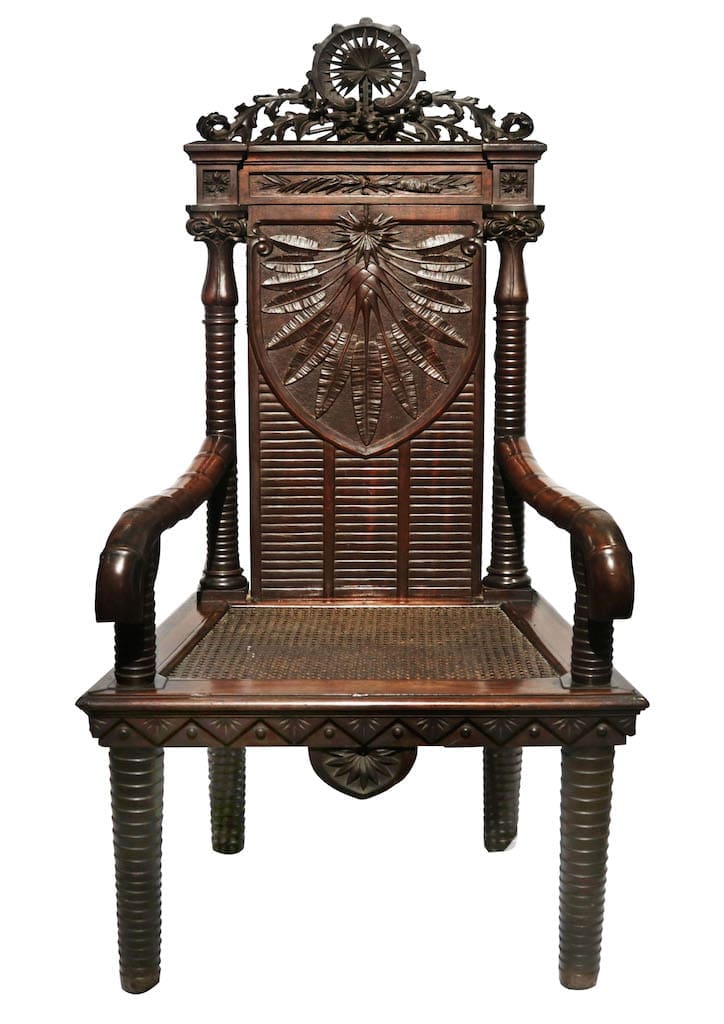 Isabelo Tampinco (1850 - 1933) Armchair 1909 Narra and Rattan H: 55” x L: 25 1/2” x W: 21 1/2” (140 cm x 65 cm x 55 cm)