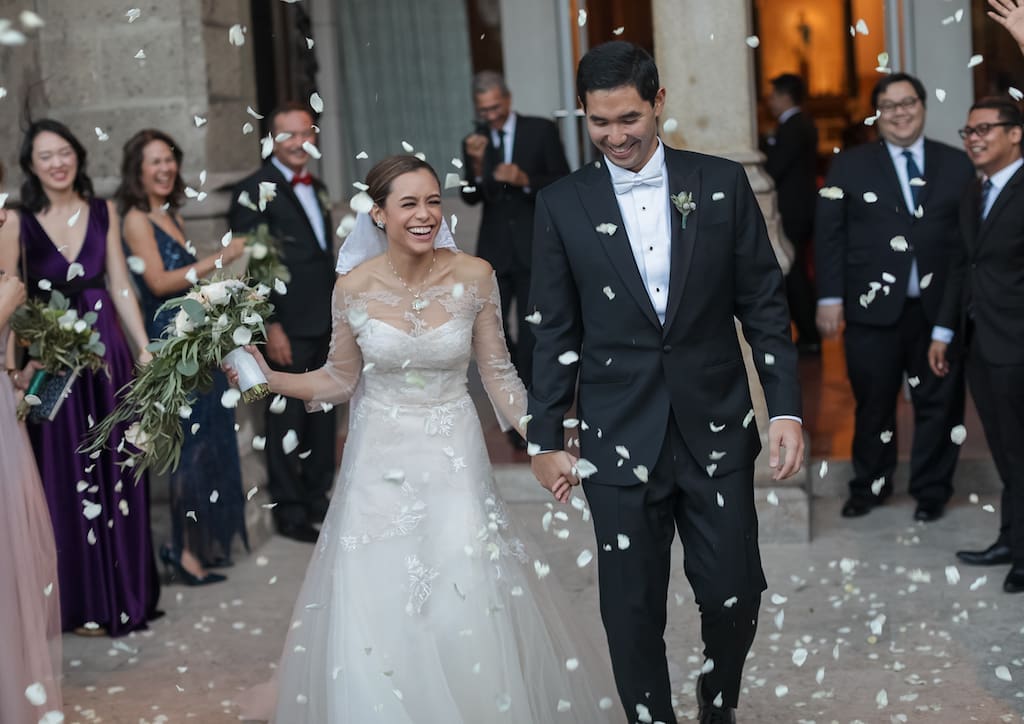 The bride and groom were showered with petals after the ceremony