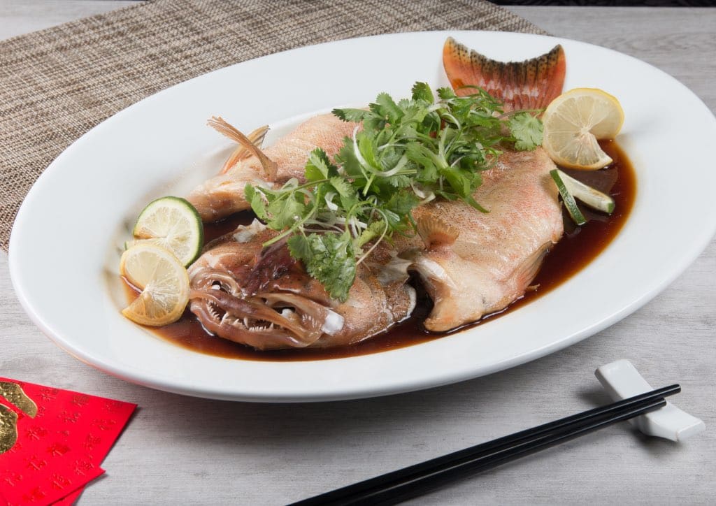 Steamed whole fish with soya sauce