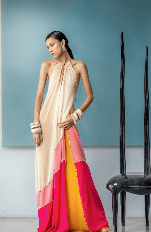 Color blocked tunic and gold silk chiffon pants, both by JUN ESCARIO. Earrings and bangles, AVATAR by BUTCH CARUNGAY