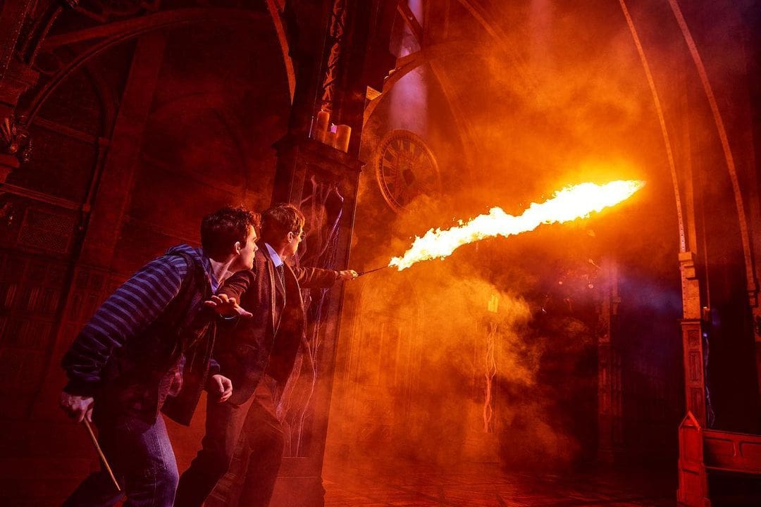 Harry Potter and his son Albus saving the wizarding world in Harry Potter and the Cursed Child.