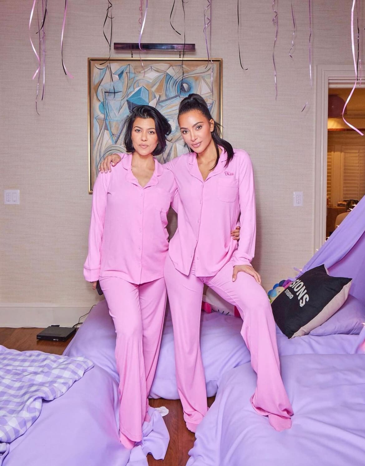 Kourtney and Kim Kardashian