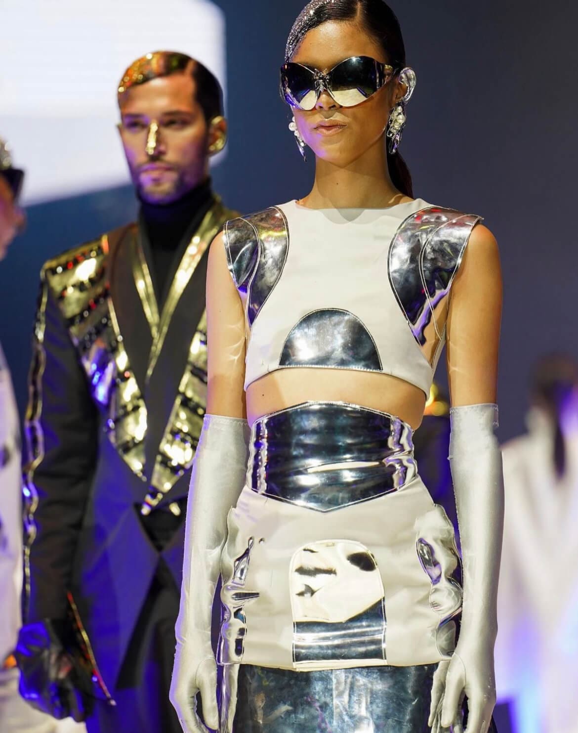 Silver and gold metallic details incorporated into the accessories, clothes, and even in the models’ spray-painted hair.