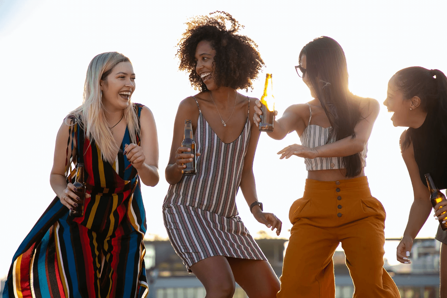 Laughing young girlfriends, enjoying life and friendship.