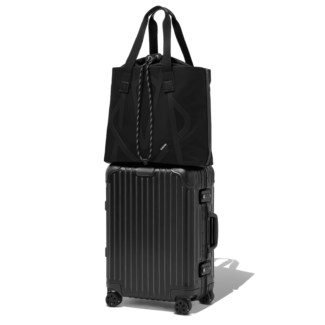 Rimowa's Sliding Tote can easily attach to larger suitcases during travel