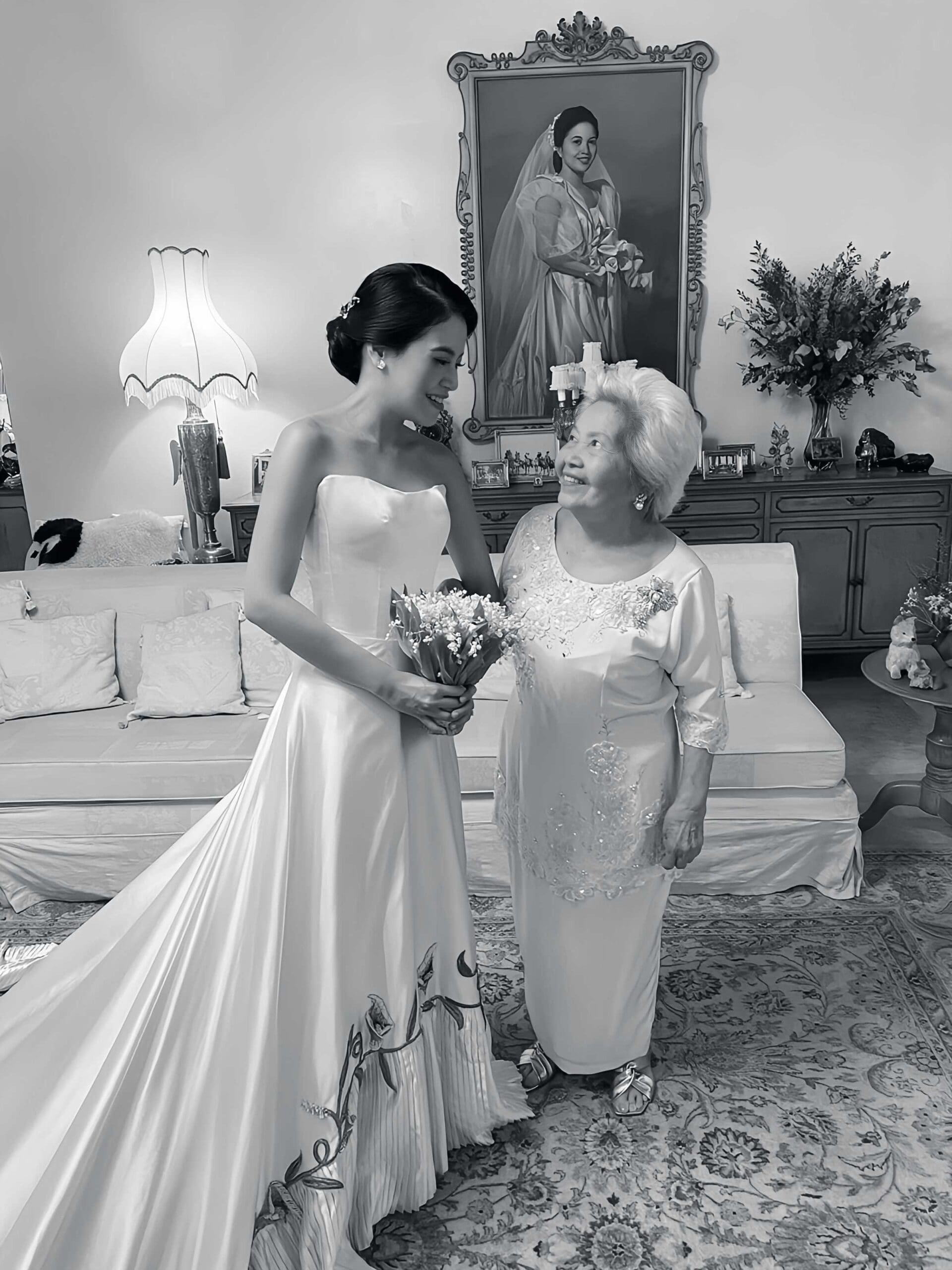 Tisha posing for a photo with Potenciana “Nita” Laurel Yupangco, fondly known as Mama Nita