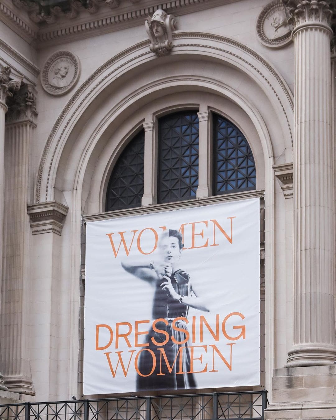 The Met's "Women Dressing Women" banner