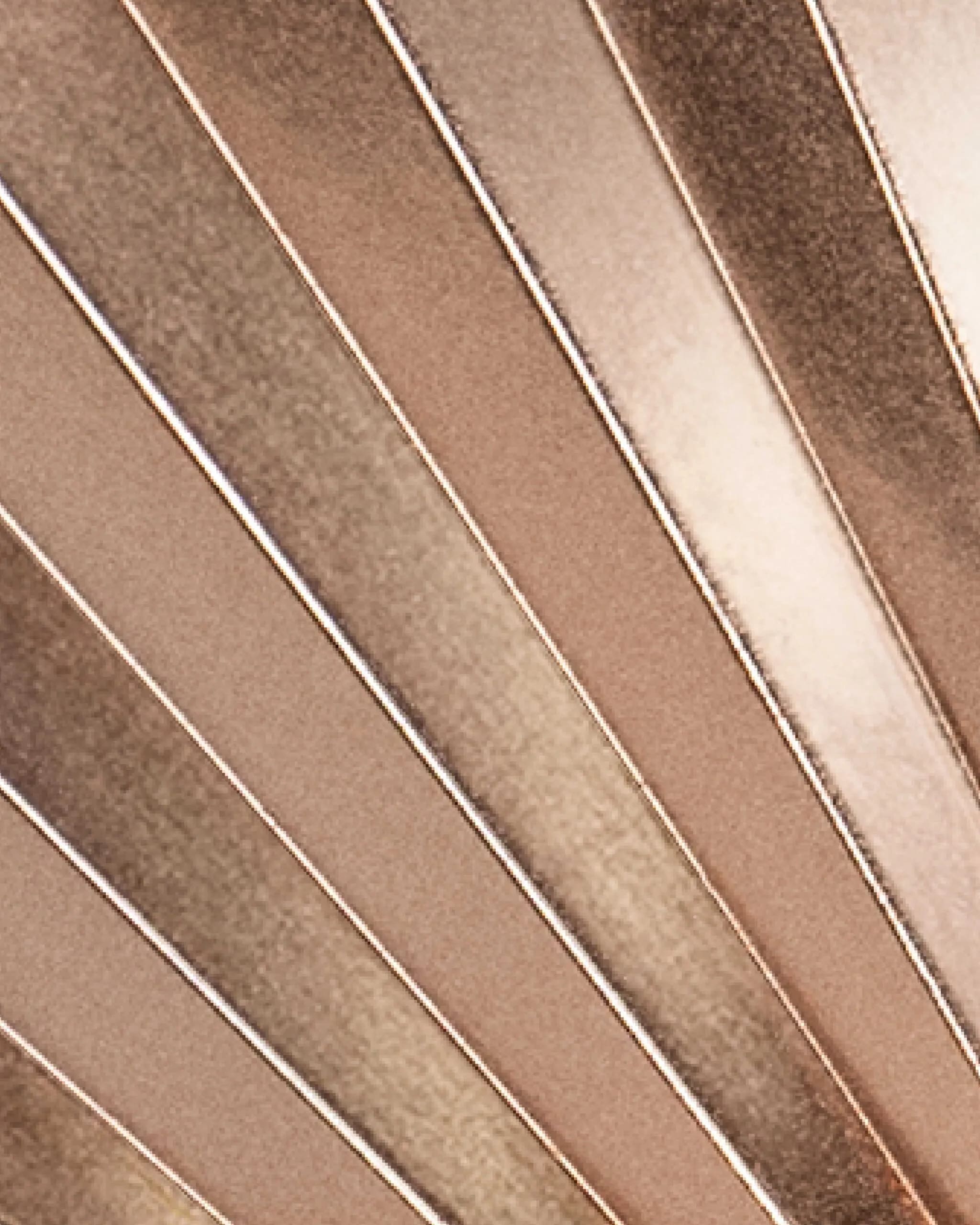 The gold, silver, or bronze pieces of the medals feature lines that represent light rays