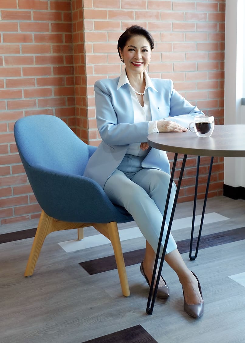 Eloisa Valenton in matching blue blazer and trousers