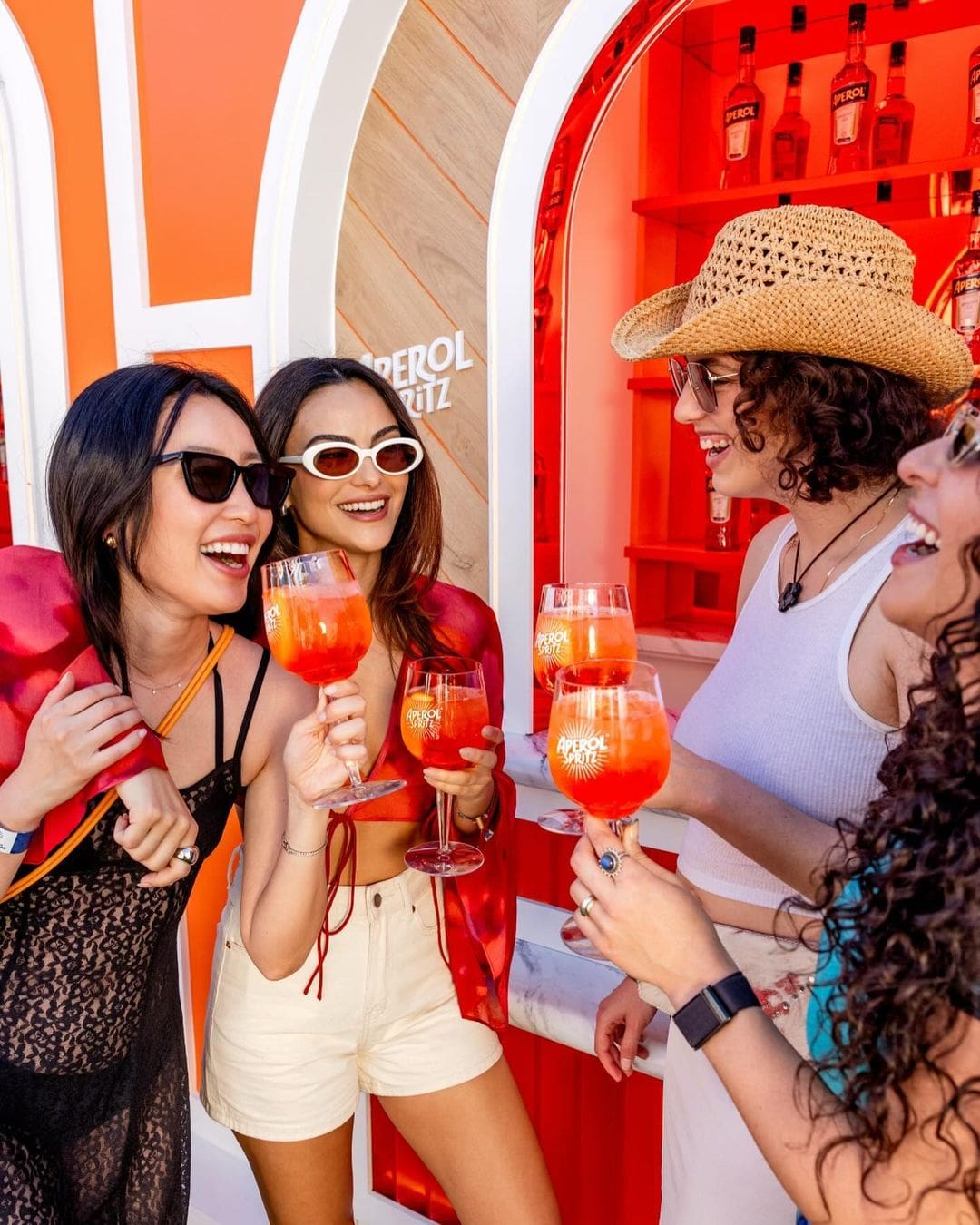 Camila Mendes, Olivia Sui, Paula Kroll, and Kiara Moreno with Aperol Spritz