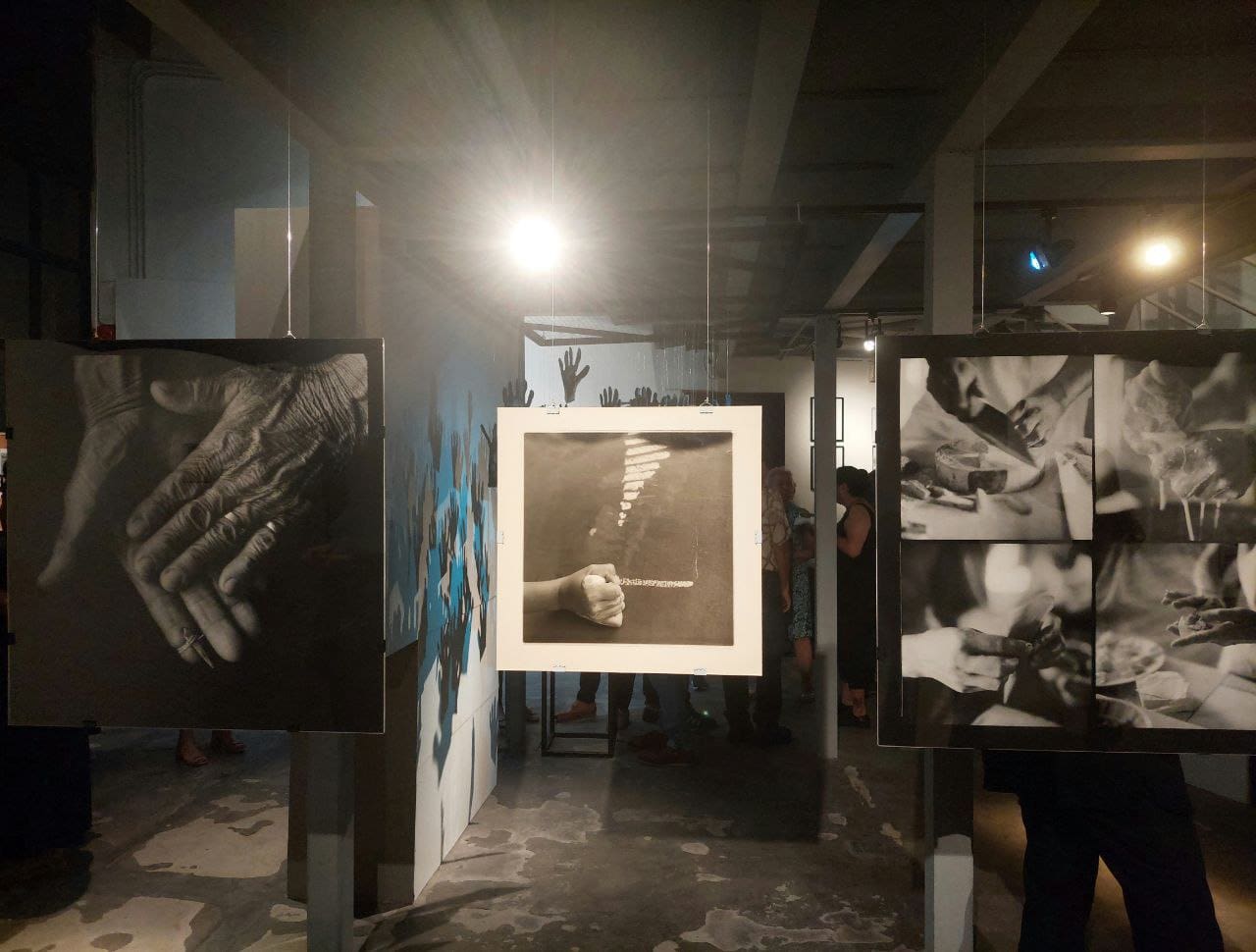 Untitled installation of cotton gloves and “Hands” (1990s-2022); both by Neal Oshima