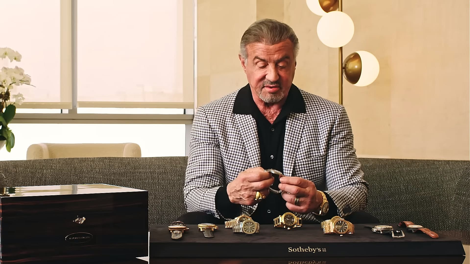Sylvester Stallone presenting his watch collection