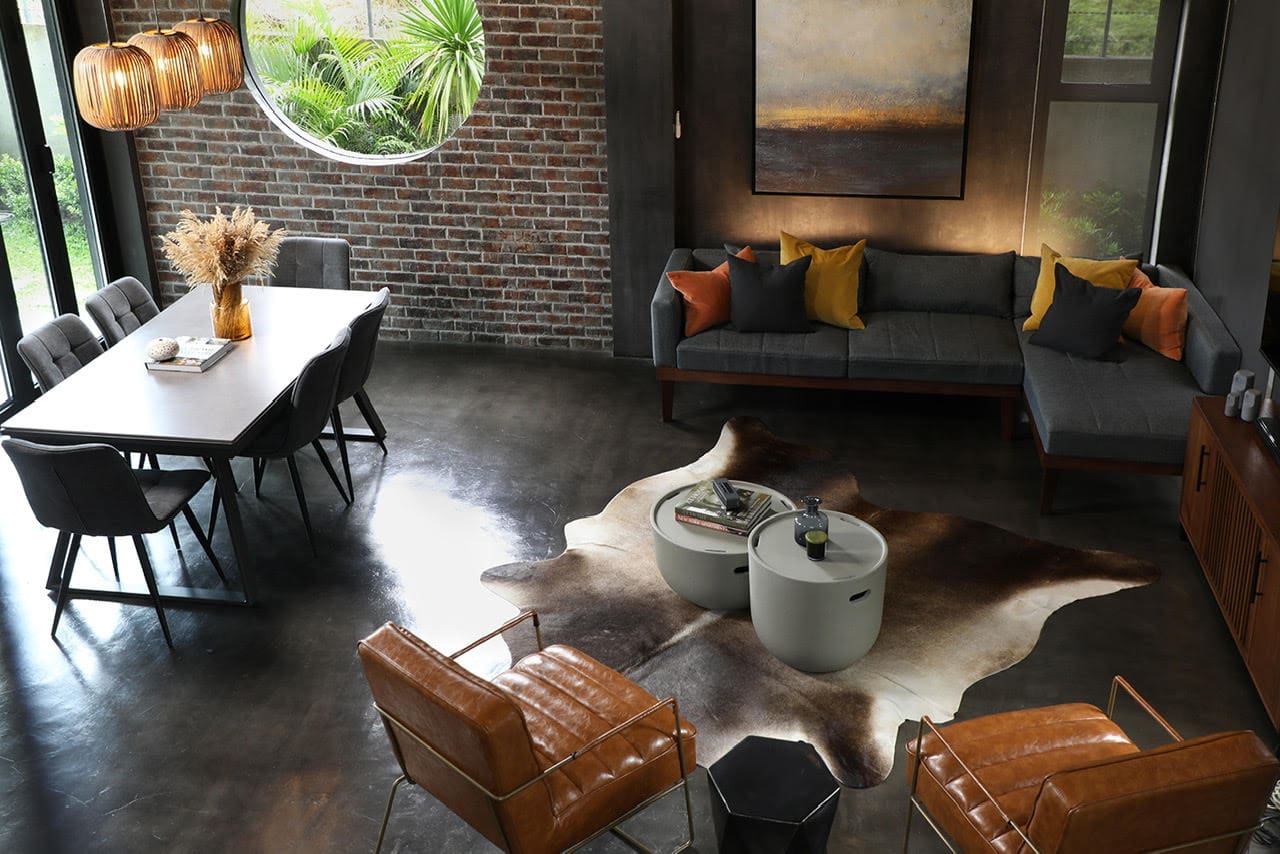 The design direction for this project was to create an industrial loft style space that the owners of the villa can use as a weekend home/Photo by Arthur Tselishchev