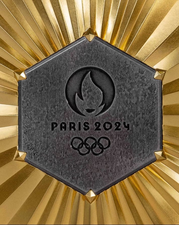 The medals are set with a piece from the Eiffel Tower
