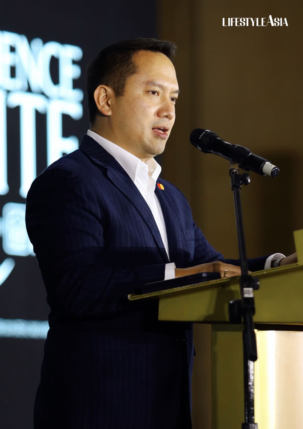 Simon Calasanz, Mastercard Philippines country manager and Celeste Marie V. Lim, PNB Consumer Finance head