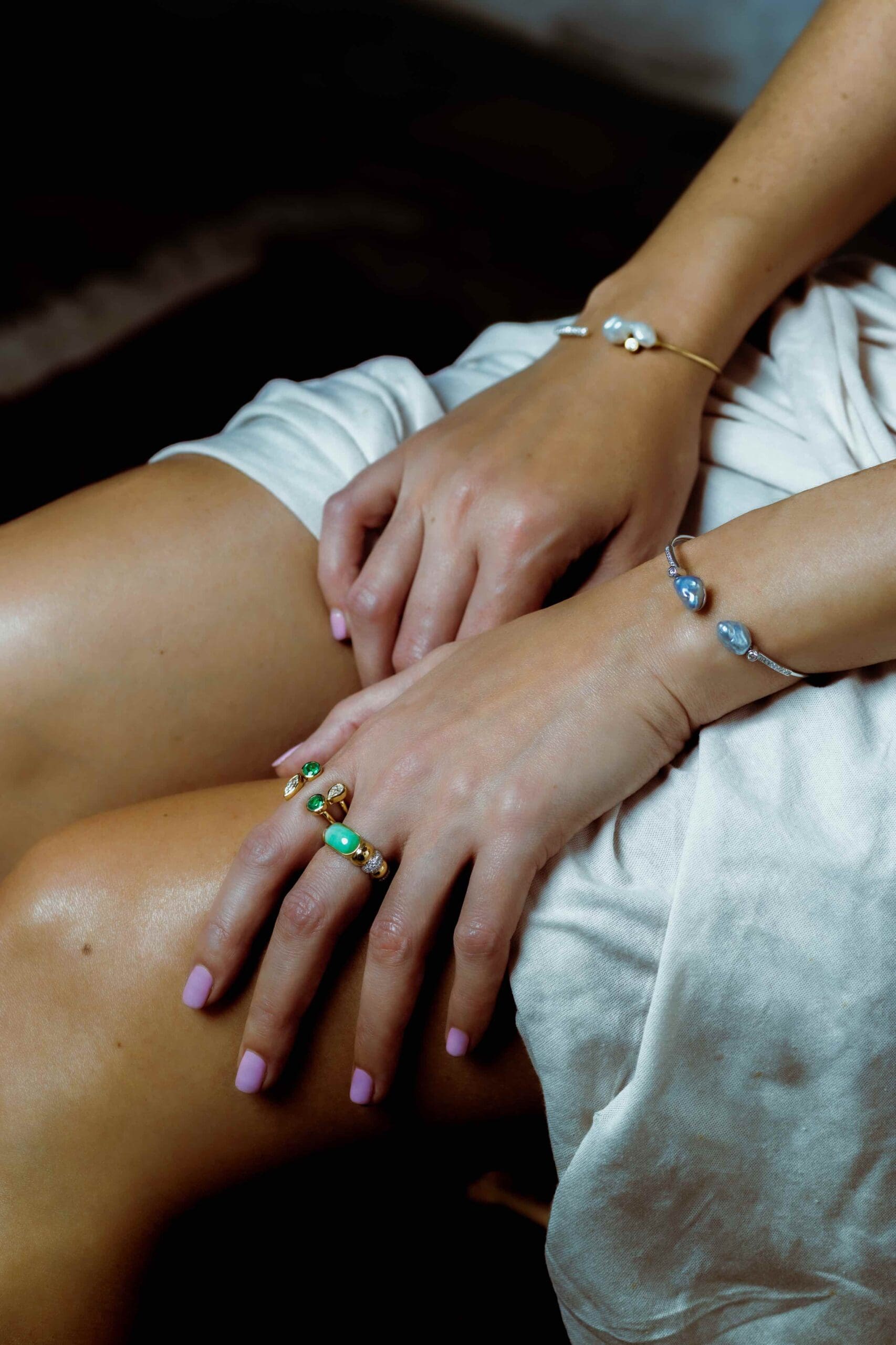 Keshi and diamond wire bangles emerald open rings and jade cabochon with diamond pave ring by Paul Syjuco