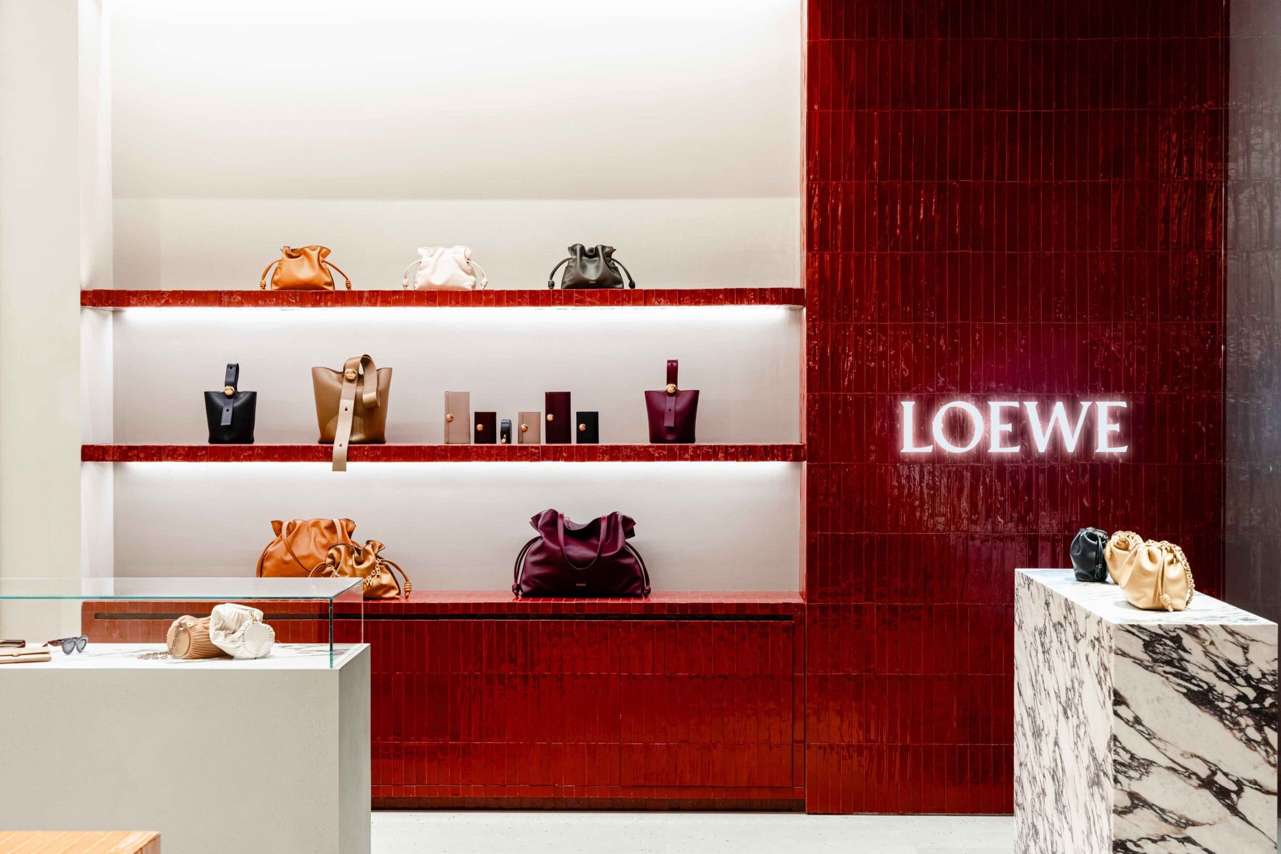 Loewe’s 144 square meter store features the CASA LOEWE concept, artistry with luxury through Spanish wool rugs, ceramic tiles, and bespoke furnishings