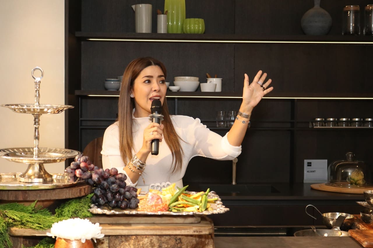 Happy Ongpauco-Tiu giving a live cooking demo featuring tasty, festive recipes