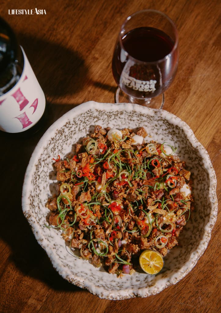 Filipino food and natural wine pairing suggestions at Bombvinos Bodega, with dishes prepared by Chef Don Baldosano: Vegan sisig served with Partida Creus Trepat; Beef fat sinangag served with Clos Lentiscus Croac Croak Pink; Bibingka pancakes served with Mein Klang Epic; Fresh cheese pasta with laing butter, served with Muz Vermut Natural Partida Creus