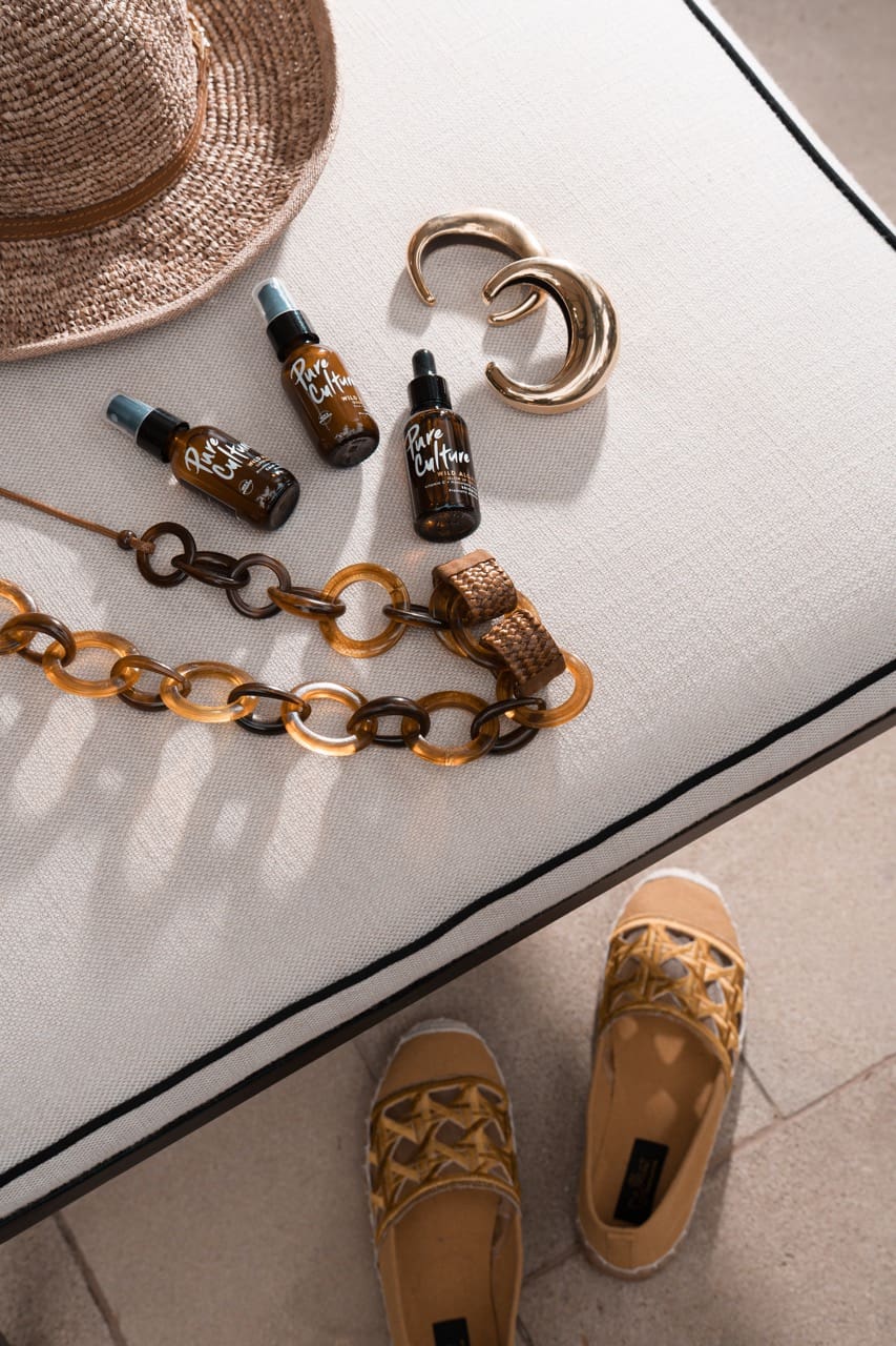 Clean skincare on the go from Pure Culture; necklace from Tina Campos; bangles from Golden Monstera; hat from R. Filart; shoes from Jhaz Footwear; Jewelry from ARAO