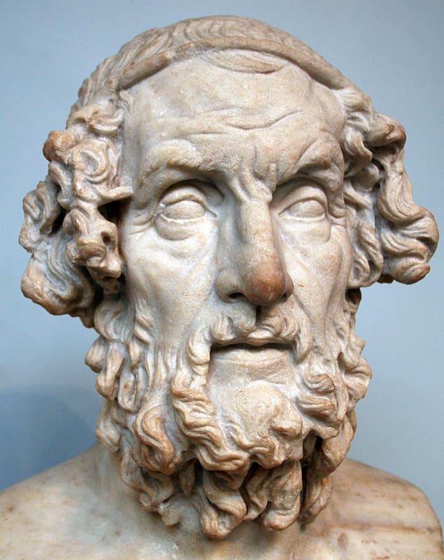 A bust of the Greek poet Homer at the British Museum, and a papyrus fragment with text from The Odyssey (c. first century B.C.) from the Getty Museum collection