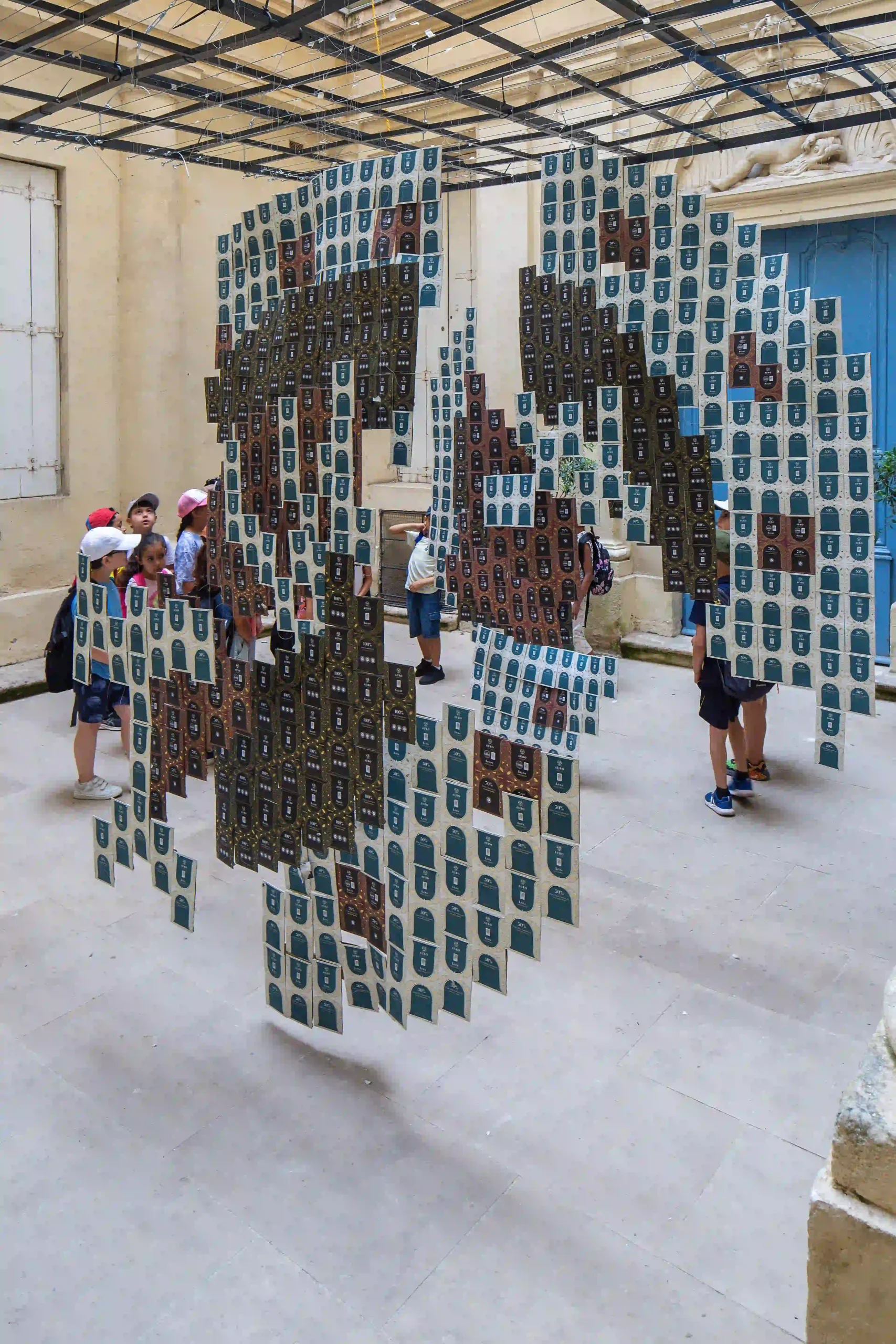 Visitors look at the WTA installation with awe