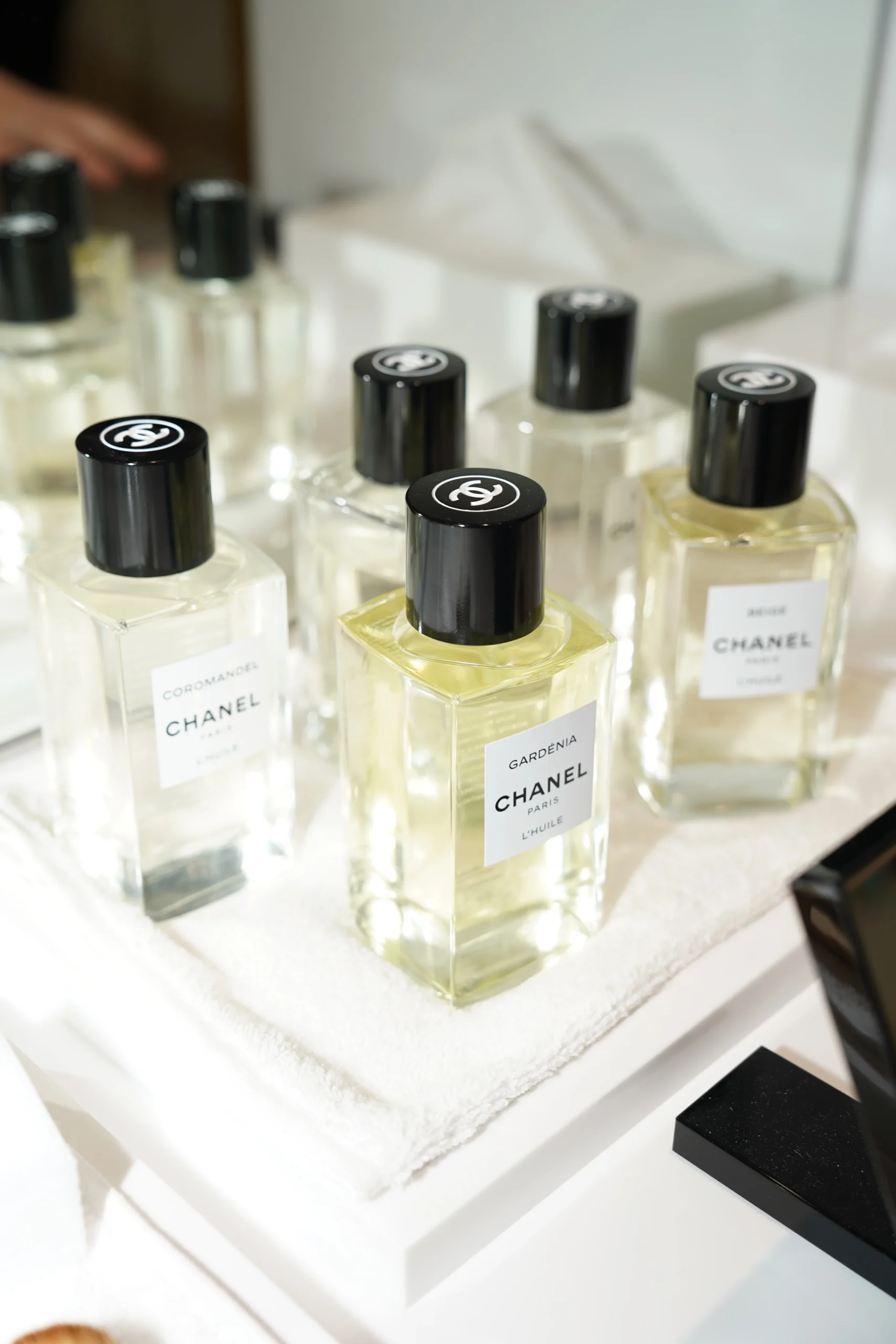 Fragrances from the Les Exclusifs De Chanel line, and details inside the Chanel Privé experience, featuring Coromandel screens