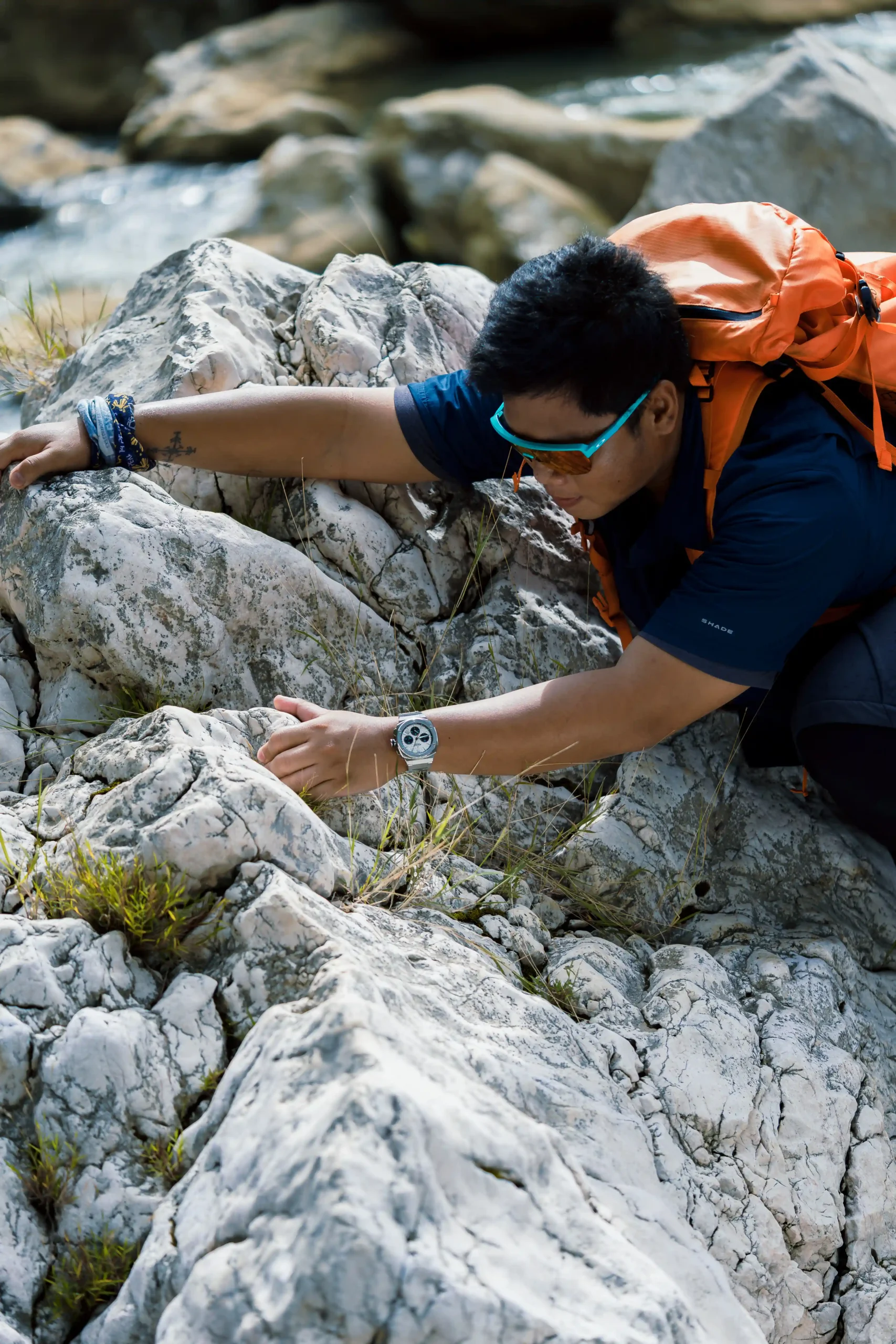 Jeno Panganiban climbs mountains in an Alpina Alpiner Extreme Chronograph Automatic 